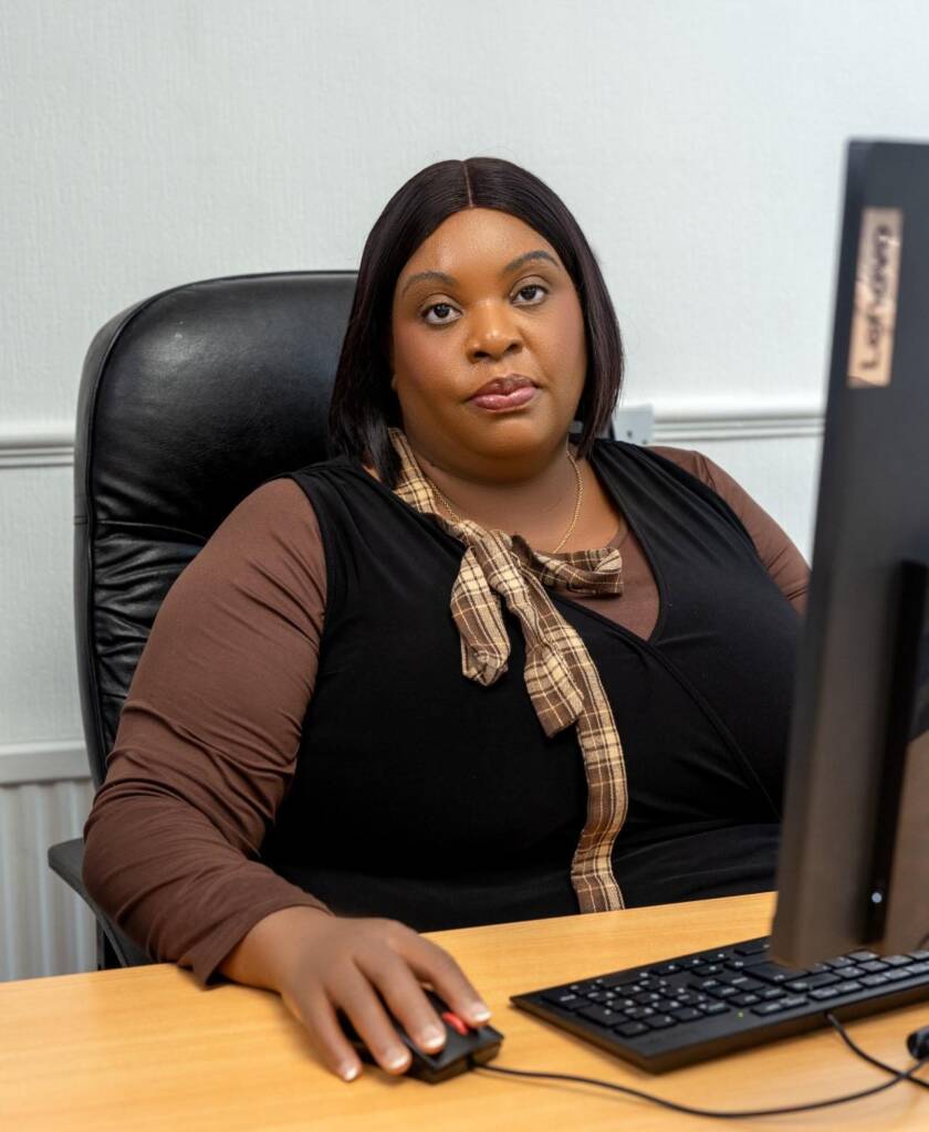 YPEP's founder working at a computer in the office