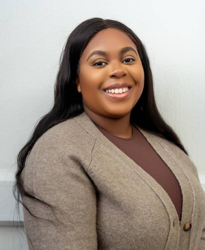 A smiling member of YPEP's office team